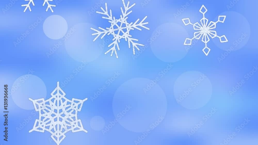 Snowflakes falling on blurry bokeh blue background. Snowflakes falling on blurry bokeh blue background.