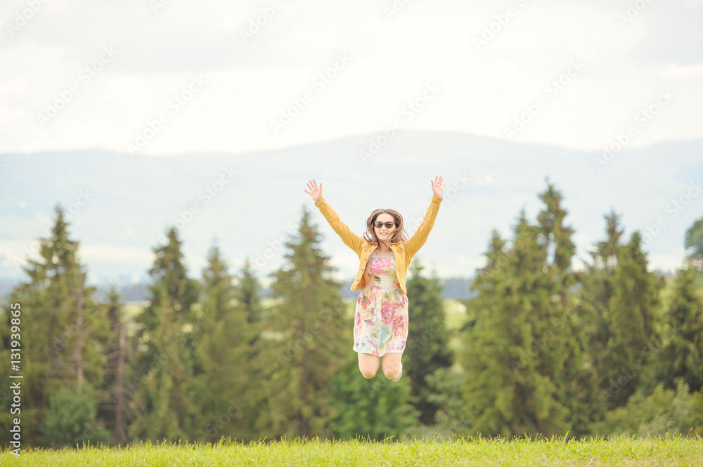 Brunette girl enjoying journey in mountains. Brunette girl enjoying journey in mountains.