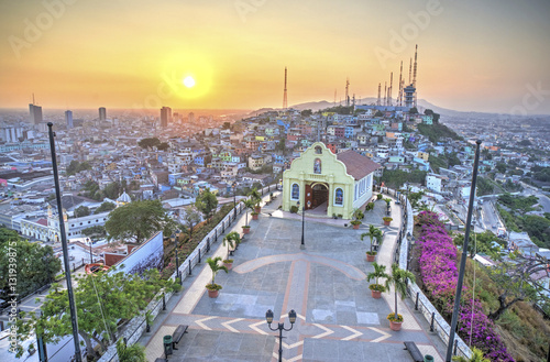 View of the Santa Ana chapel and the city of Guayaquil, from the top of the lighthouse on the Santa Ana hill. Late afternoon. Guayaquil, Ecuador. photo