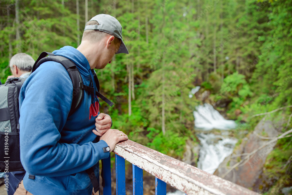 Man tourist in mountain trail Man tourist in mountain trail