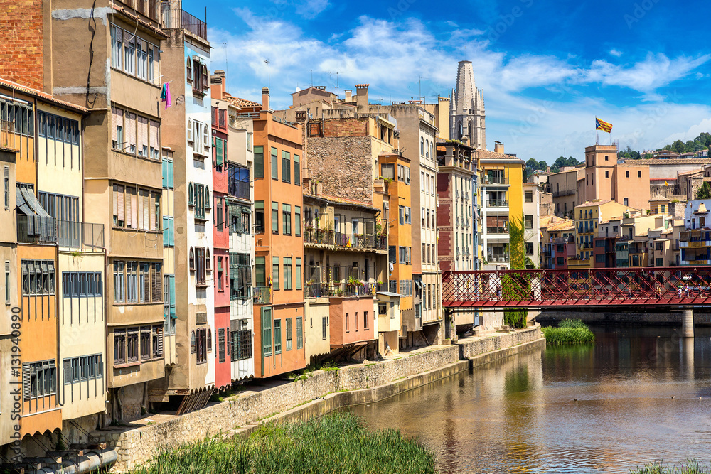 Colorful houses and Eiffel bridge in Girona