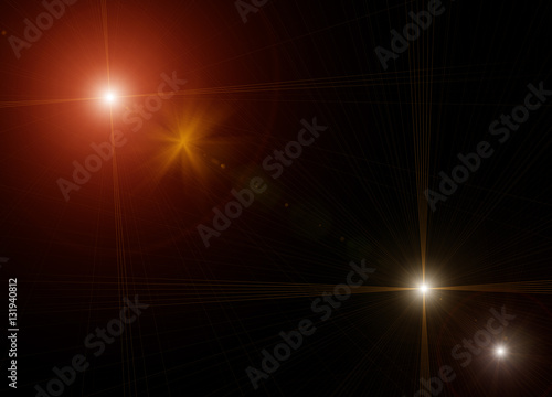 Abstract of lighting for background. digital lens flare in dark background with retro tone.