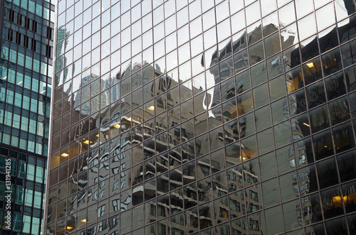 Midtown Manhattan NYC intersecting high-rise buildings architectural background reflections