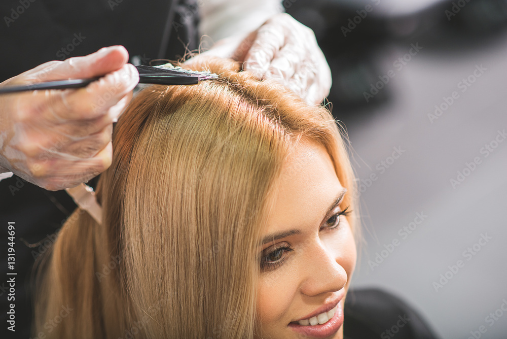 Fototapeta premium Professional stylist is working with a client