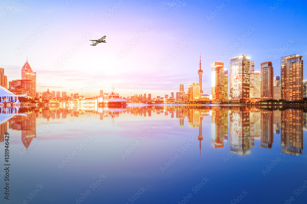 Fototapeta premium Shanghai skyline on the Huangpu River at sunset,China