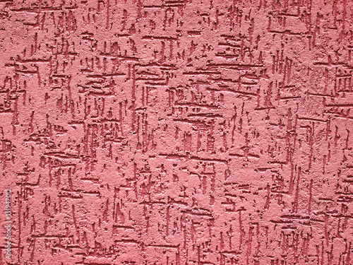 Detail of a textured, red e...