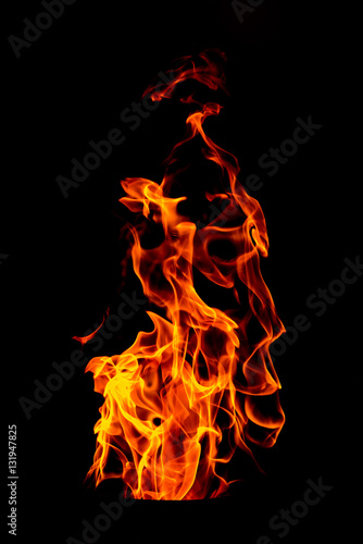 Fire flame isolated on black isolated background - Beautiful yel