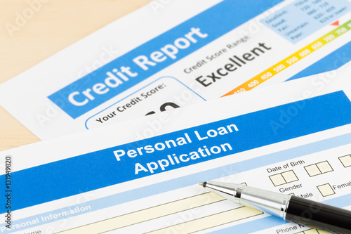 Personal loan application form excellent credit score with pen