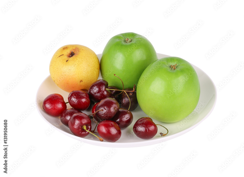 Apple, cherry and pear fruits in a plate isolated on the white background Apple, cherry and pear fruits in a plate isolated on the white background