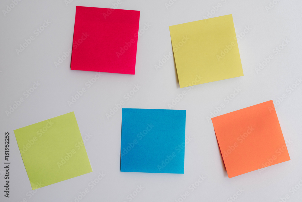 colorful sticky notes on a horizontal white background