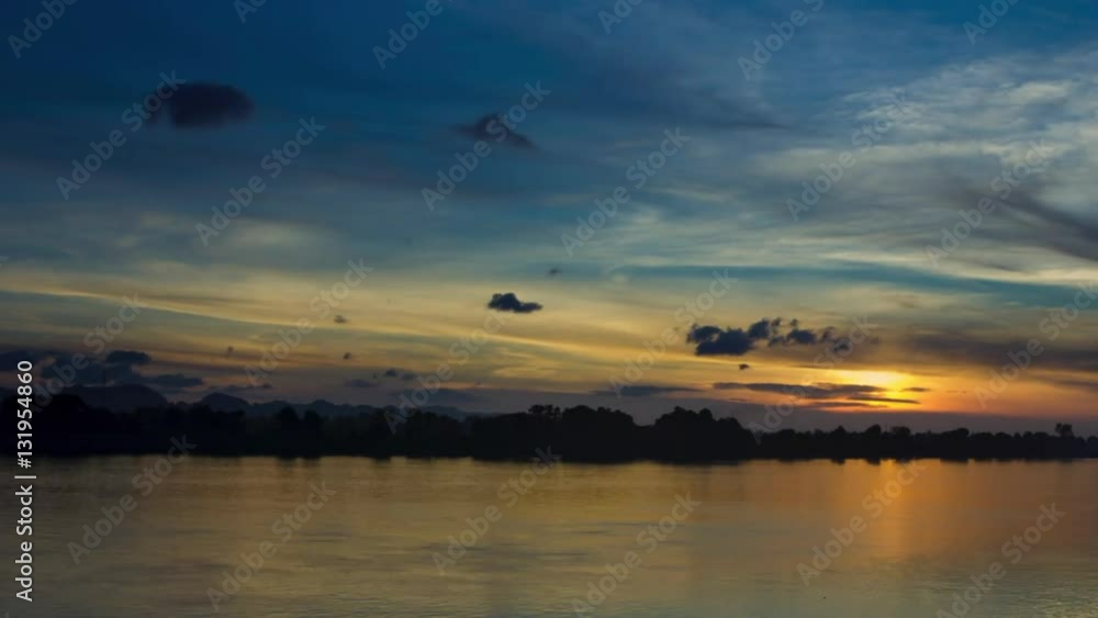 Time lapse of majestic Mekong river in sunrise. landscape in Laos on the opposite bank, view from Thailand