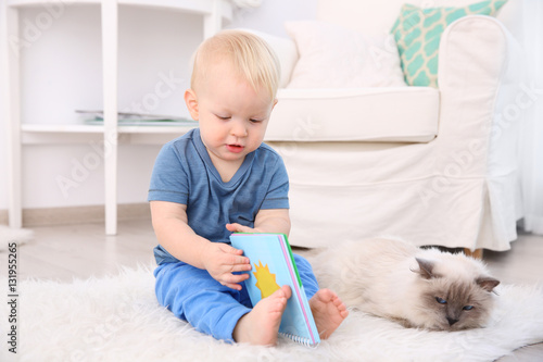 Cute little boy with fluffy...