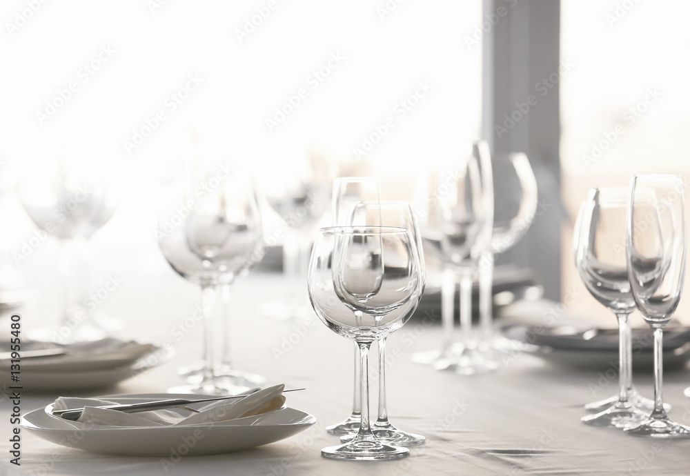 Served table in modern restaurant Served table in modern restaurant
