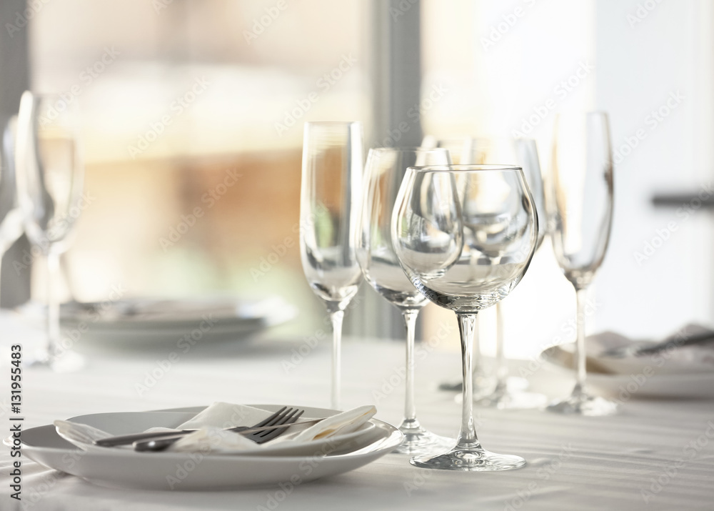 Served table in modern restaurant Served table in modern restaurant