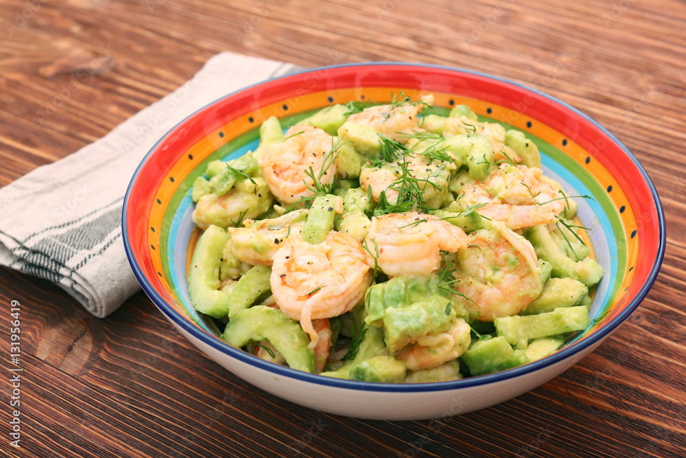 Avocado salad with shrimp and cucumber. Healthy lifestyle and eating concept.