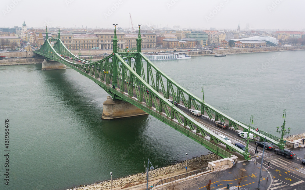 Liberty Bridge in Budapest in a snowy december morning