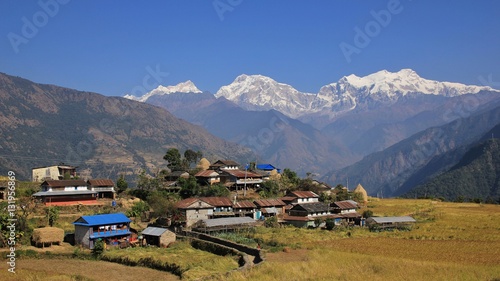 Village Sikle and snow capped Manaslu