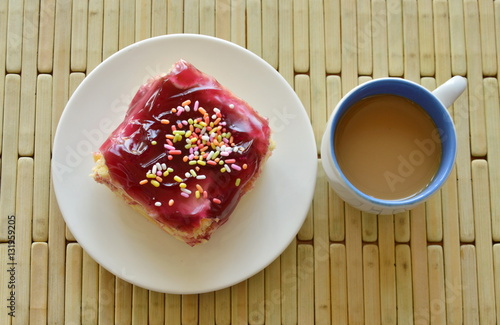 blueberry butter cake topping colorful candy and coffee