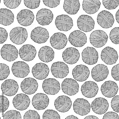 Vector doodle seamless pattern of ball of yarn.