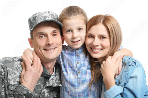 Happy soldier with family o...