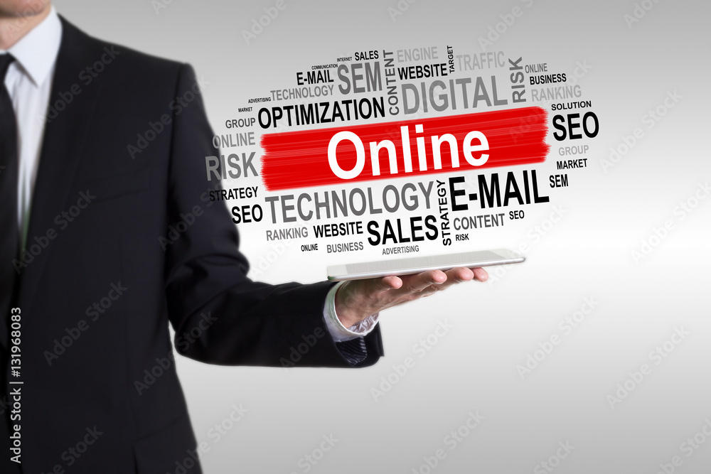 Online concept. Man holding a tablet computer Online concept. Man holding a tablet computer