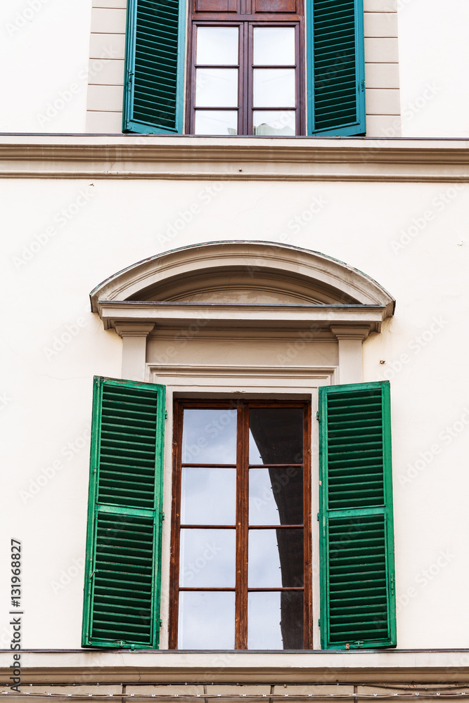 Fototapeta premium window with blinds in urban house in Florence