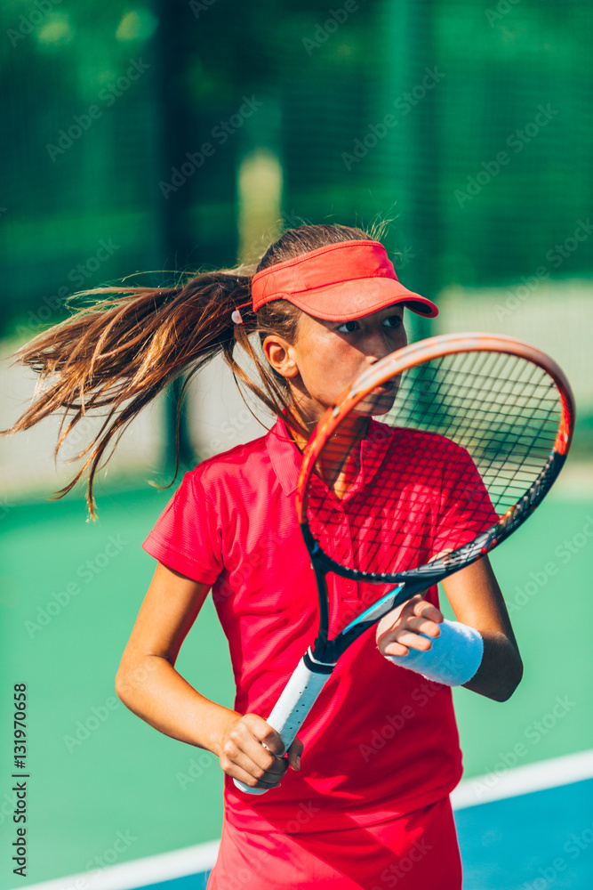 Girl on tennis match.Girl playing tennis
