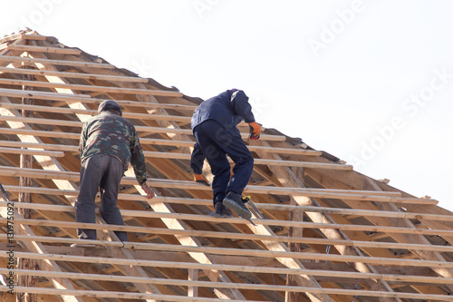 Wallpaper Mural workers working on the roof Torontodigital.ca