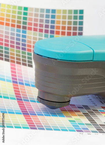 Spectrometer used for proofing on a leaf of the test print