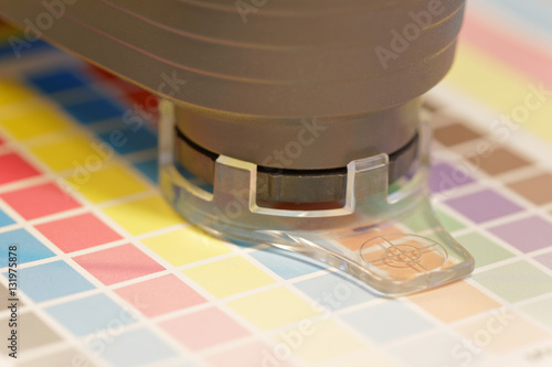 Spectrometer used for proofing on a leaf of the test print photo