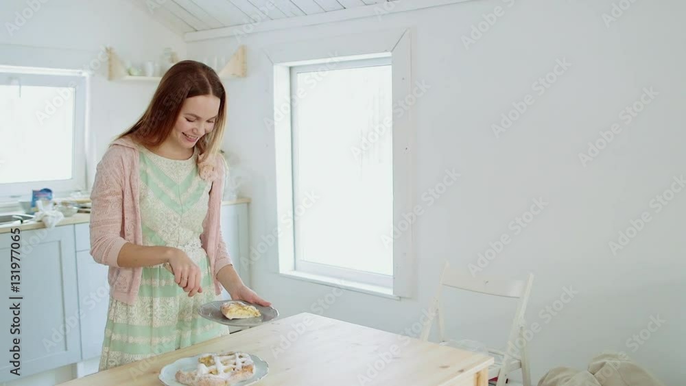 Beutiful girl slicing freshly baked apple pie with sharp kitchen knife. Knife slicing piece of cake. Hands rotating plate with apple pie. Piece of fresh apple pie with a golden crust. Ready apple pie Beutiful girl slicing freshly baked apple pie with sharp kitchen knife. Knife slicing piece of cake. Hands rotating plate with apple pie. Piece of fresh apple pie with a golden crust. Ready apple pie