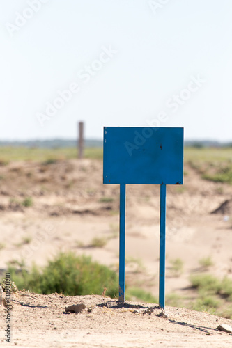 blue sign in the desert