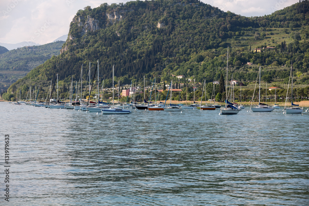 Sailboats  at Porto di Bardolino harbor on The Garda Lake . Italy
