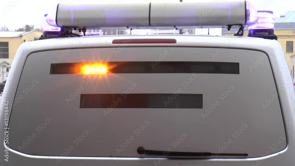 Special car with lights flashing blue and red stop sign Special car with lights flashing blue and red stop sign
