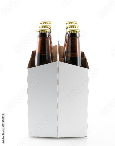 Fotografie Six bottles of beer in cardboard carrier
