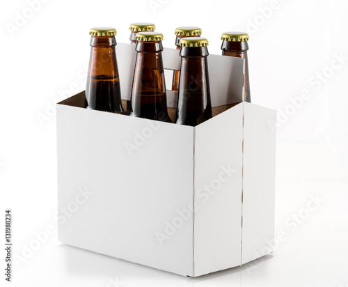 Obraz na plátně Six bottles of beer in cardboard carrier