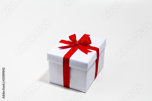 Gift box with Red Ribbon on white background 