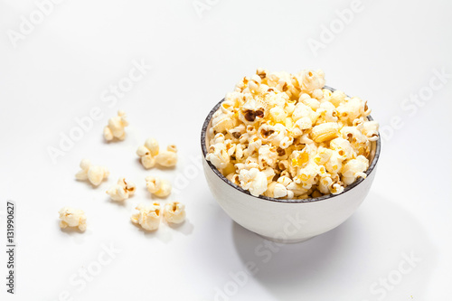 Popcorn in a dish on a white