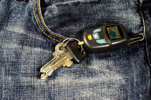 Car keys on a blue jeans