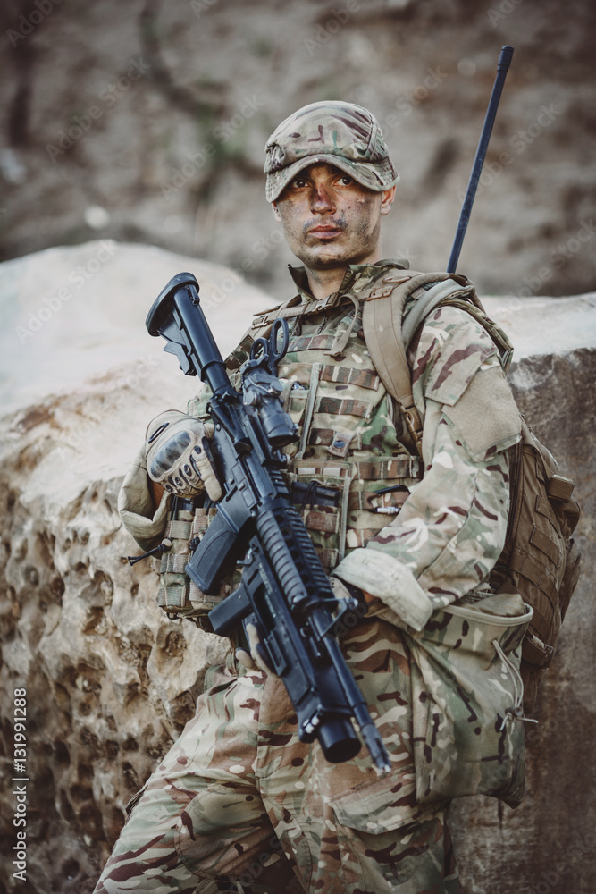 Fototapeta premium Army sniper during the military operation in the mountain. war,