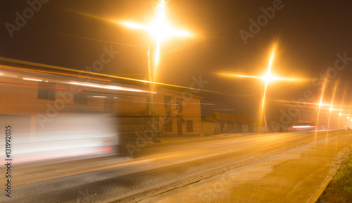 road at night with moving cars