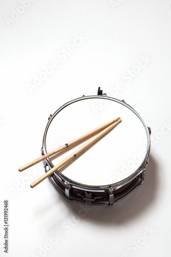 Drum and Drumsticks on white background 