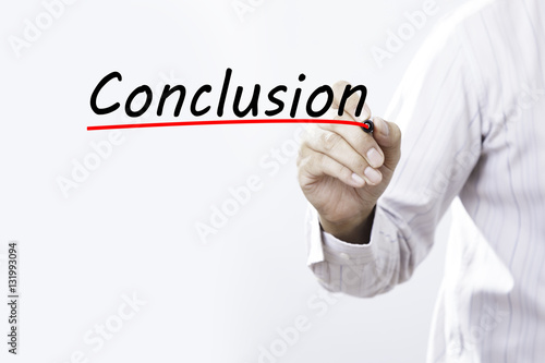 Photos Businessman hand writing conclusion with red marker on transpare
