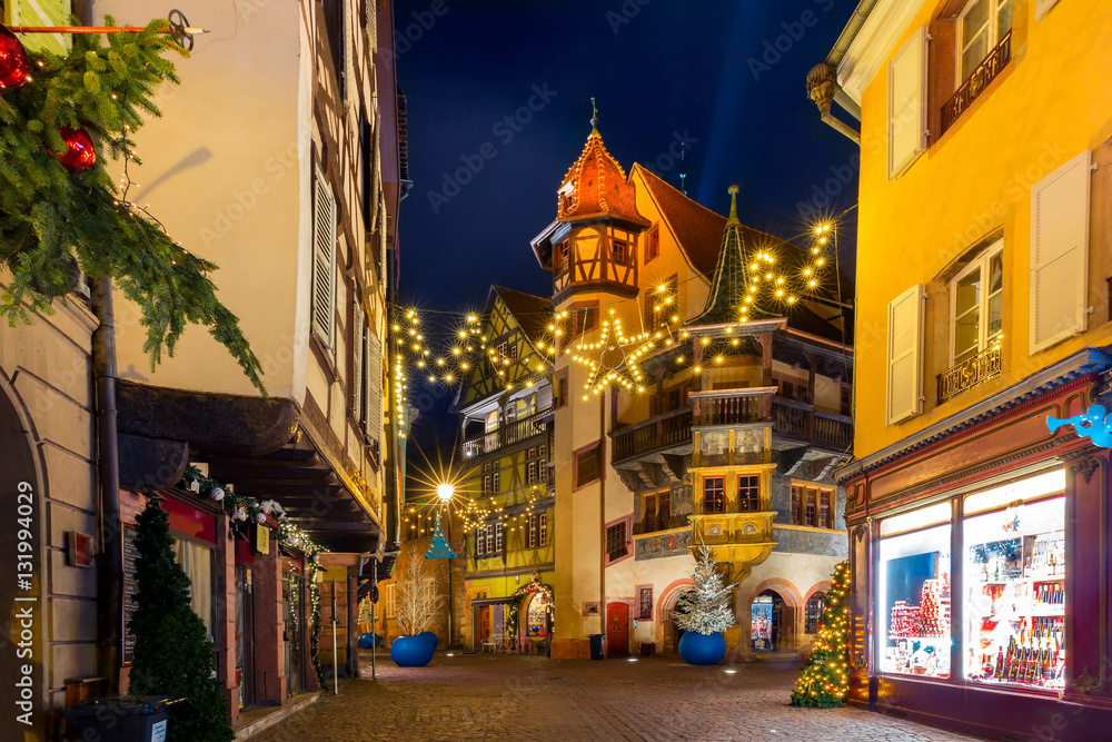 Maison Pfister in old town of Colmar, decorated and illuminated at christmas time, Alsace, France