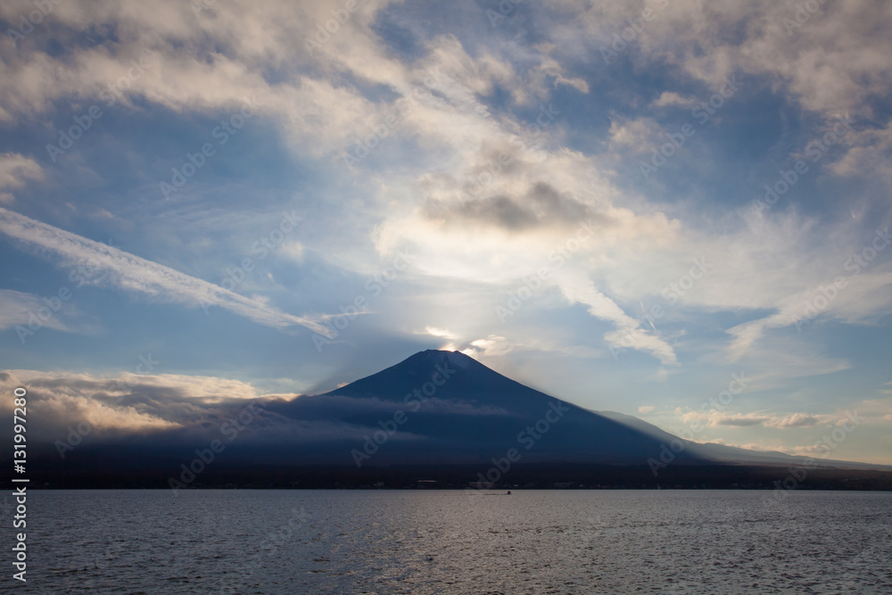 Fuji diamond , Sunset on Top of Mountain Fuji and refection at Lake Yamanakako in autumn season