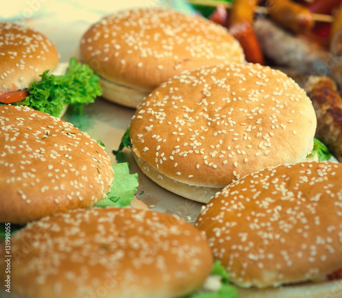 Hamburgers with salad and meat, street food. Selective focus