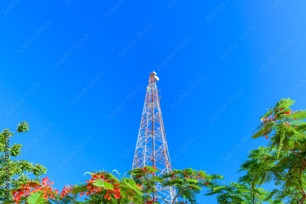 Telecommunication tower on blue sky  background.