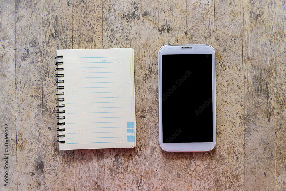 notebook and smartphone on wood table, smartphone notebook and smartphone on wood table, smartphone