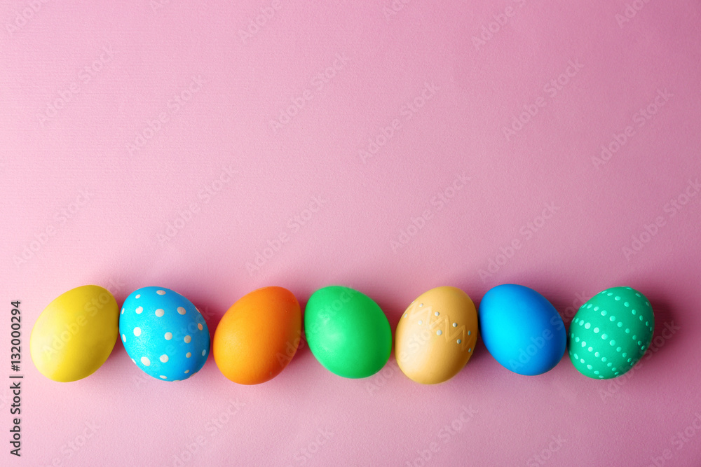 Colorful Easter eggs on pink background Colorful Easter eggs on pink background