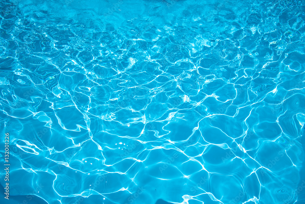 Blue water surface and ripple wave in pool